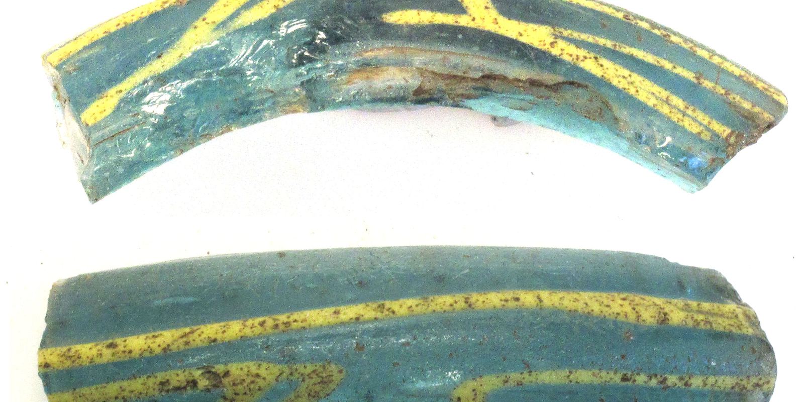 A green Roman glass bottle