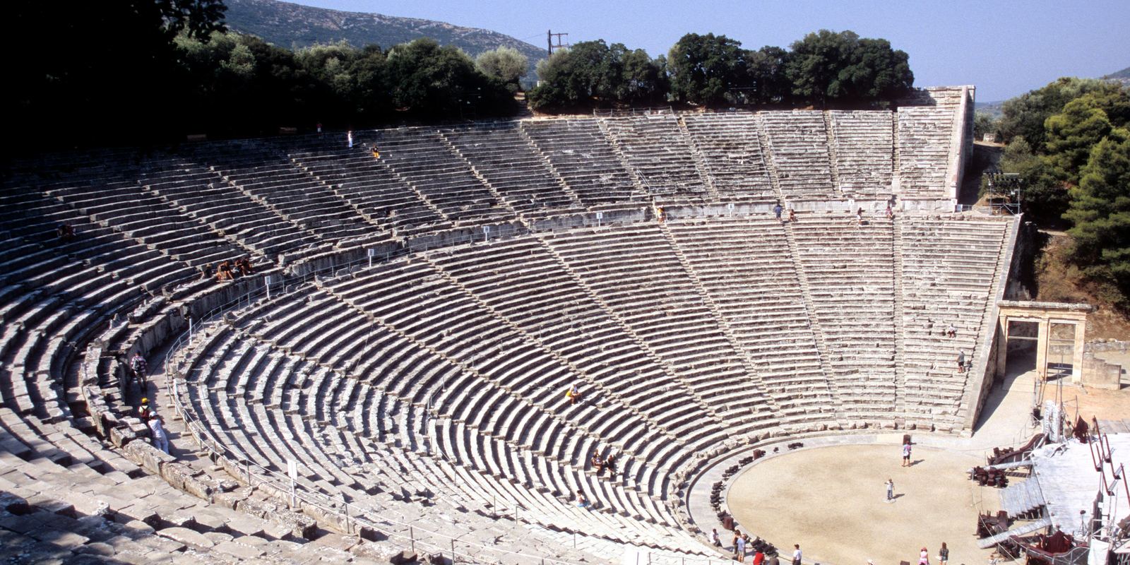 The semicircular stone seating of the ancient theatre at Epidaurus