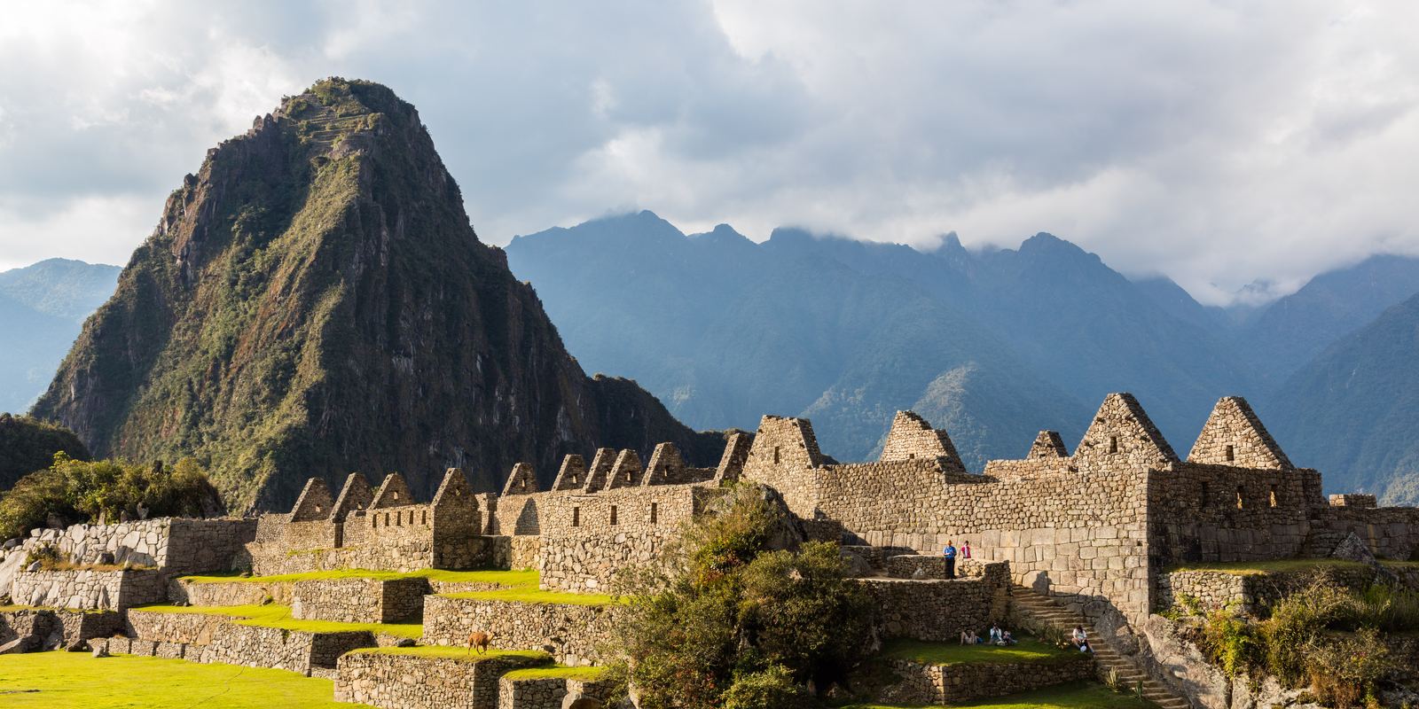 Machu Picchu's terraces and stone buildings on a mountain ridge